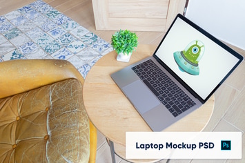 Laptop on wooden desk - home office workspace