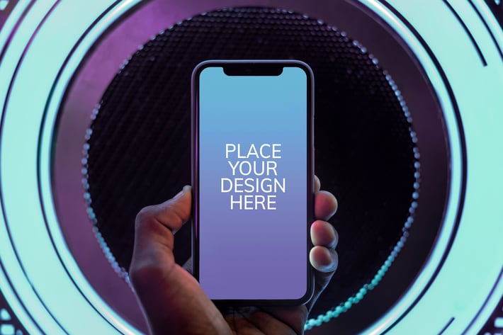 Smartphone screen mockup on glowing neon lights