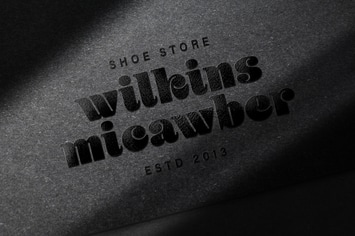 Glossy Black Logo Mockup on Dark Paper