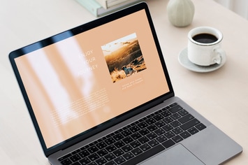 Laptop mockup on a wooden table