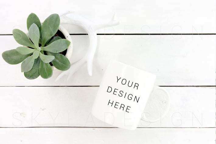 White coffee cup mockup plant