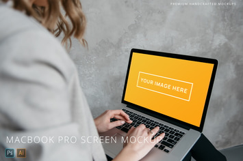 Person Working on Macbook at Office Mockup