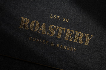 Debossed Gold Logo Mockup on Dark Paper