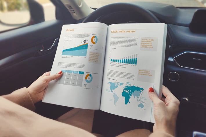 Book / Catalog In Hand Mockup