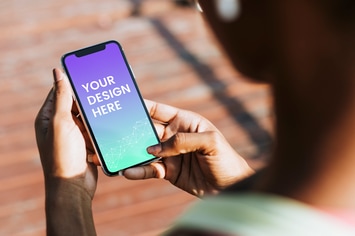sportive woman using her phone in a park mockup