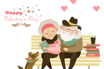 Old couple in love sitting on bench