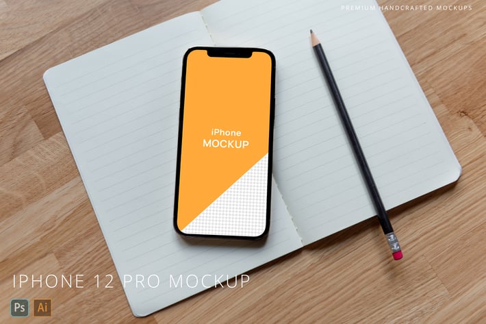 iPhone 12 Pro Mockup on Notebook Wooden Background