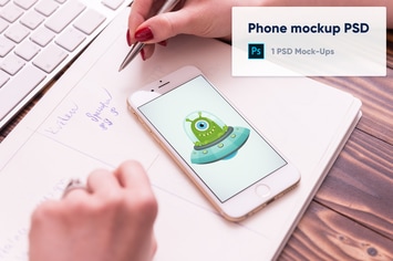 Phone on paper notebook, two hands, Mockup PSD