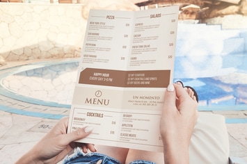 Bi-fold Menu In Hand Mockup