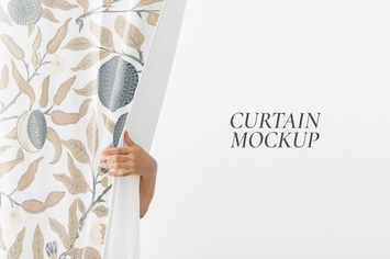 Hand opening a white curtain mockup