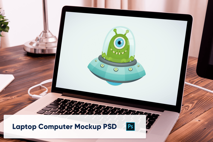 Laptop on Wooden Desk in Office - Mockup PSD