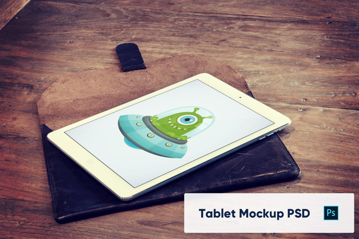 Tablet on Wooden Table Mockup PSD