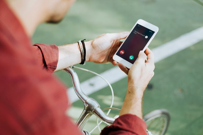 Cyclist Stop And Using His a Phone