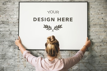 Blonde Girl Holding a Mockup Frame