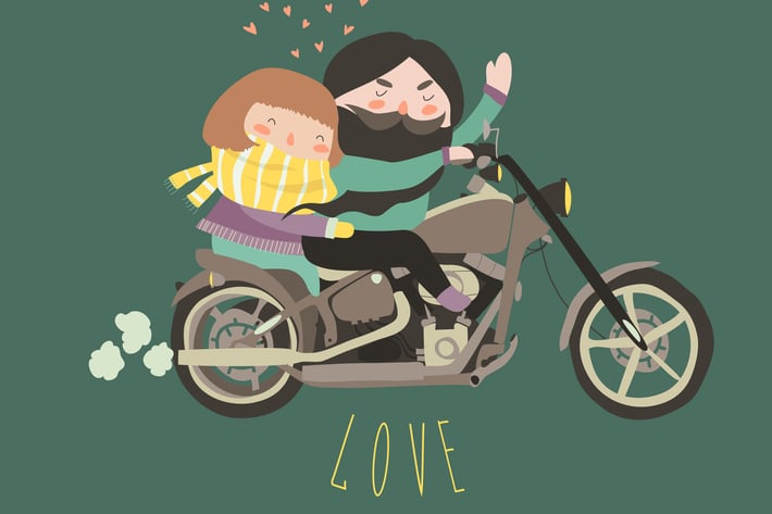 Happy couple in love riding a motorcycle
