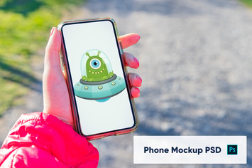 Phone in woman's hand - Mockup PSD