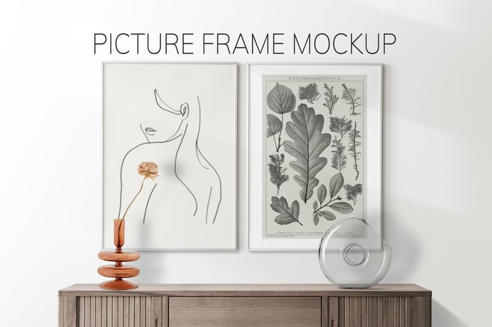 Picture frame mockup hanging on the white wall