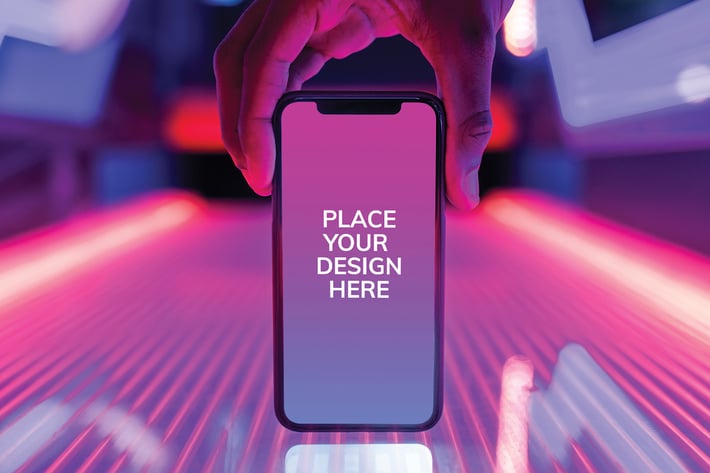 Smartphone screen mockup on glowing neon lights