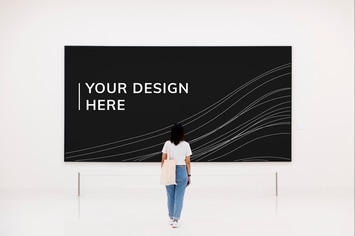 Woman looking at signboard mockup