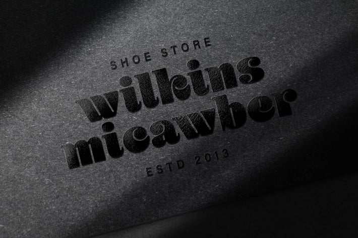 Glossy Black Logo Mockup on Dark Paper