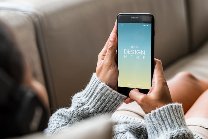 Woman listening to music from phone Mockup