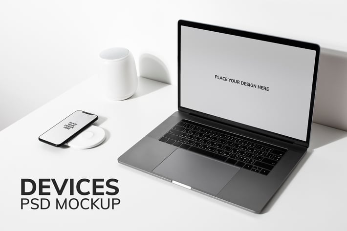 Laptop screen mockup psd on a white table