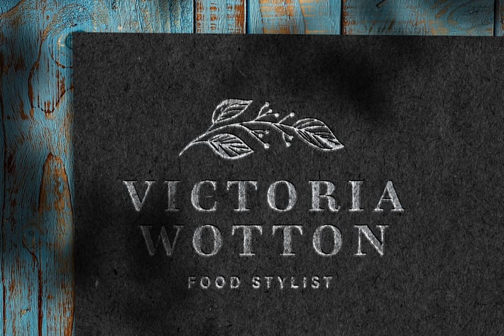 Debossed Silver Logo Mockup on Dark Paper