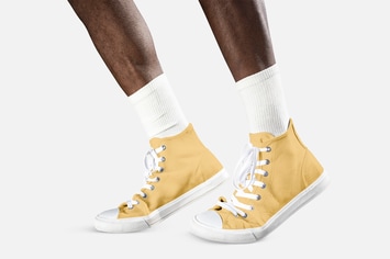 Man wearing sneakers design mockup