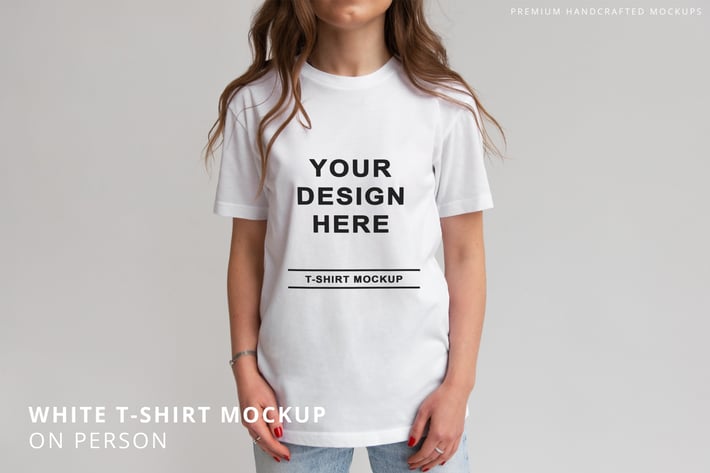 White T-Shirt on Person Mockup Grey Background 