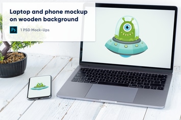 Laptop, Phone and Bonsai on Wooden Background PSD