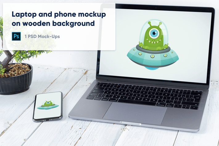 Laptop, Phone and Bonsai on Wooden Background PSD