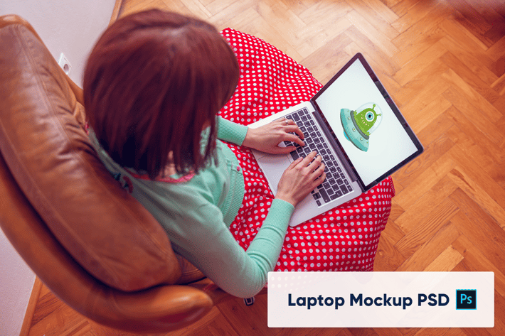 Sitting woman using the laptop - Mockup PSD