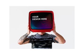 Person with tattoo holding television Mockup
