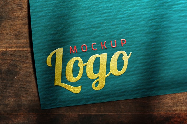 YDM Logo Mockup on Wood Table