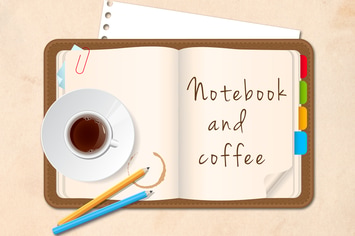 Notebook and Coffee Cup