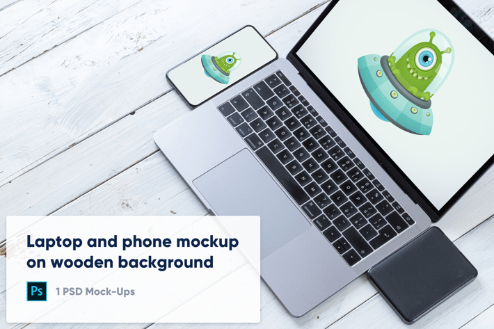 Laptop and Phone on Wooden Background PSD Mockup