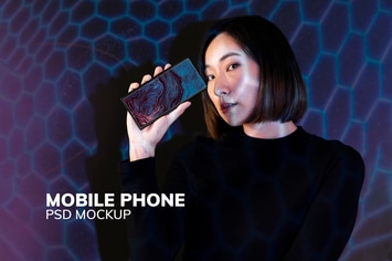 Woman showing smartphone screen mockup psd