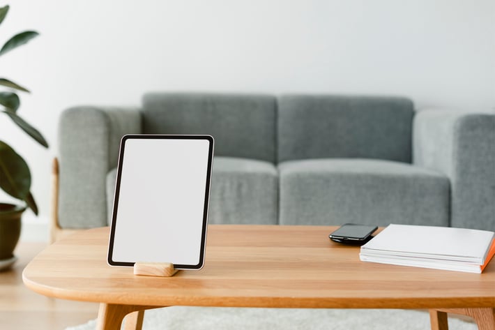 Digital Tablet Screen Mockup on a Wooden Table