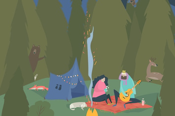 Man and woman sitting in camp near bonfire. Outdoo