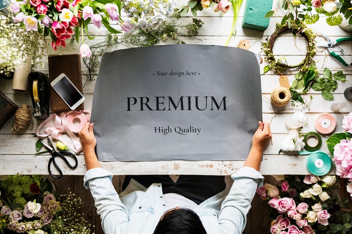 Florist Showing Paper Design Mockup
