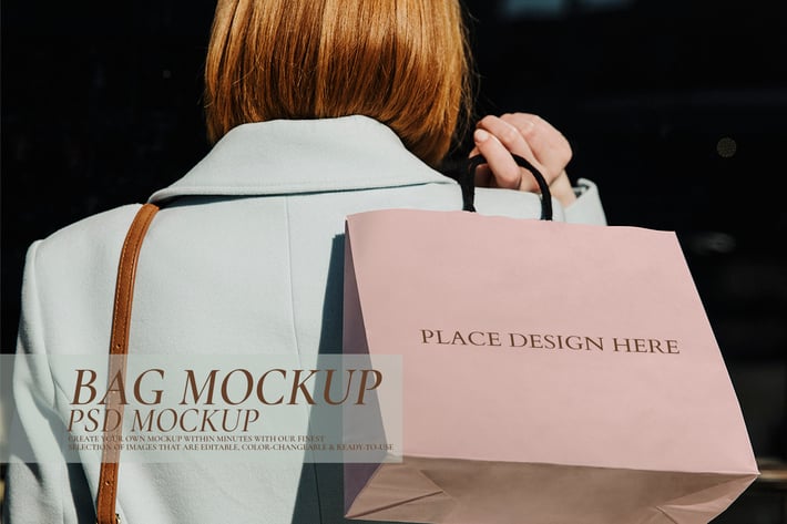 Woman carrying a minimal paper bag mockup