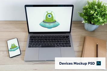 Phone and Laptop on wooden desk - workplace mockup