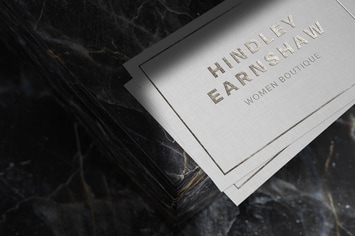 Silver logo mockup on linen paper