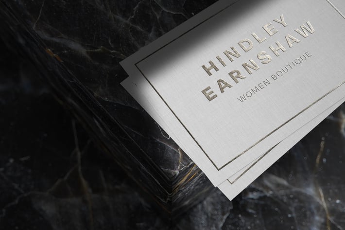 Silver logo mockup on linen paper