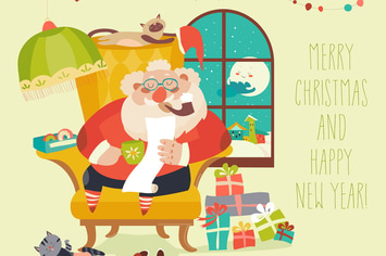 Santa Claus sitting in armchair and reading letter