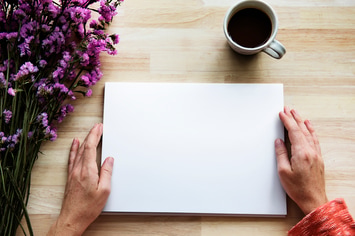 Blank Paper Mockup on Wooden Table 
